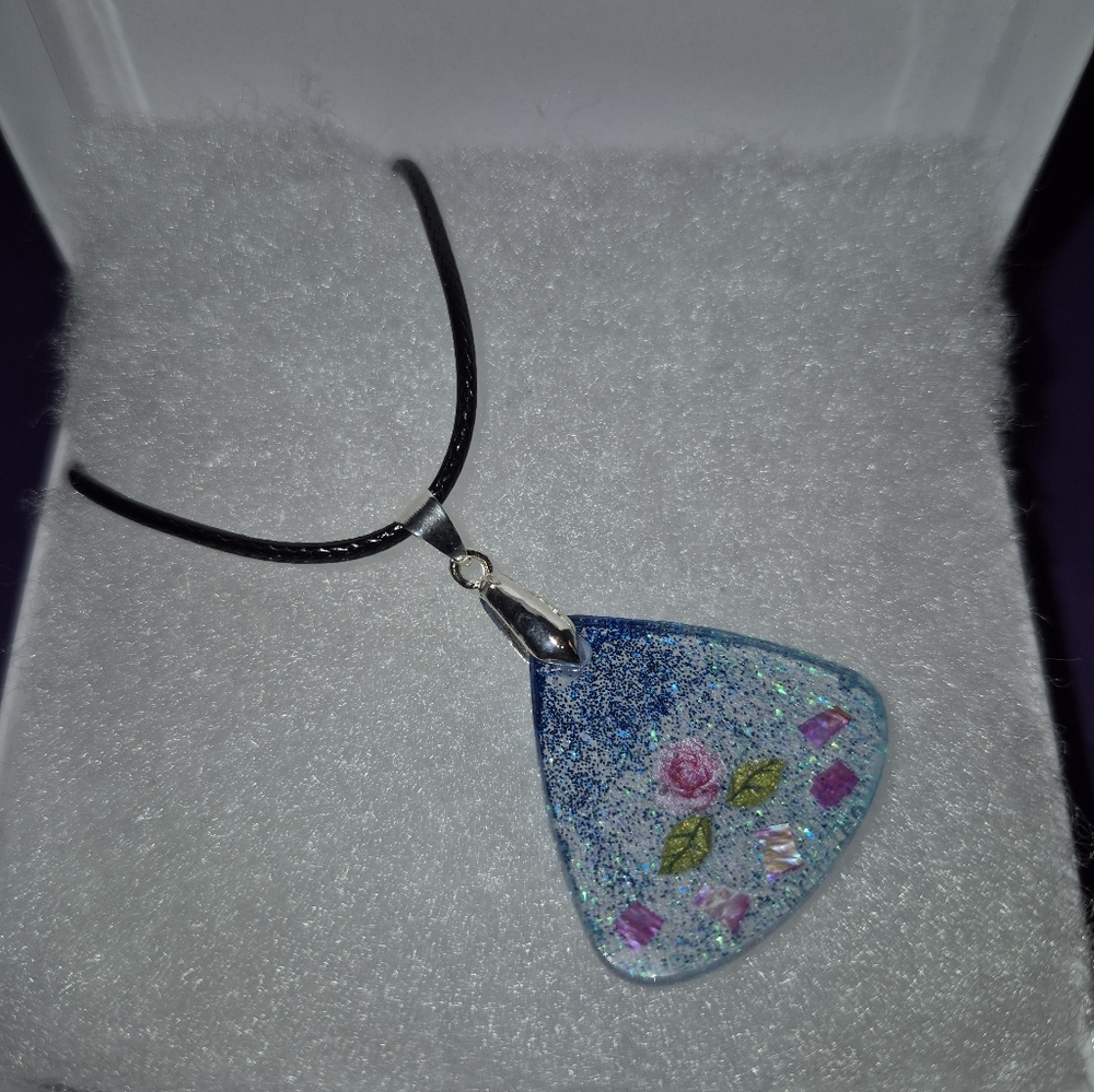 Whimsical Blue and Pink Handmade Resin Necklace with Embedded Elements